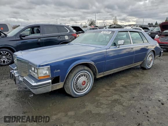 ✅ 1984 Cadillac Seville • VIN: 1G6AS6989EE809567 • Лот: 94370185. Опубликован ранее на Copart с пробегом 1 116 миль. Бесплатный доступ к архиву аукционных продаж из США и подробный отчёт об истории автомобиля на DreamBid. Изображение 1.