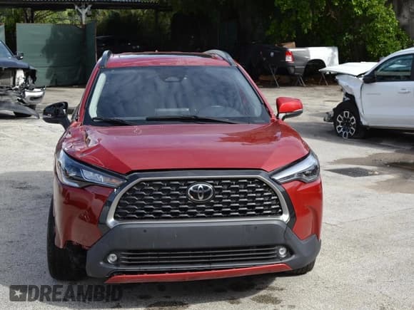 ✅ 2023 Toyota Corolla Cross XLE • VIN: 7MUDAAAG3PV055118 • Лот: 86477925. Опубликован ранее на Copart с пробегом 19 380 миль. Бесплатный доступ к архиву аукционных продаж из США и подробный отчёт об истории автомобиля на DreamBid. Изображение 3.