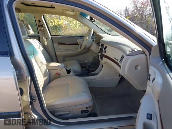 2003 Chevrolet Impala LS z VIN 2G1WH52K339112387, wystawiony jako IAAI lot #43544936 z przebiegiem 151 105 mil mil oraz . Historia ofert i sprzedaży dostępna na DreamBid. Obrazek 5.