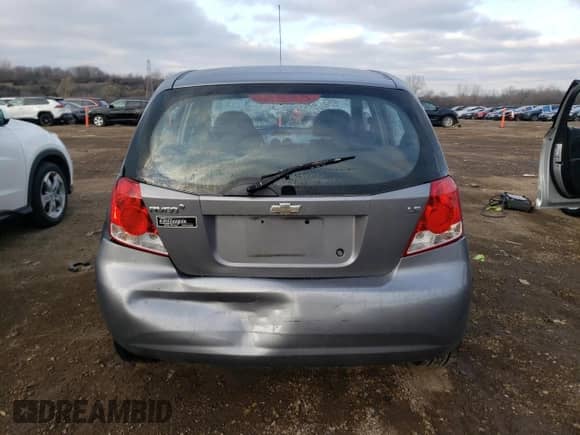 2007 Chevrolet Aveo LS z VIN KL1TD66637B749946, wystawiony jako Copart lot #83143564 z przebiegiem 74 030 mil mil oraz Szkoda całkowita • Salvage title. Historia ofert i sprzedaży dostępna na DreamBid. Obrazek 6.