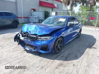 ✅ 2021 BMW 3 Series M340i • VIN: 3MW5U7J01M8B63122 • Lot: 43583344. Listed on IAAI with 73,945 mi. Free auction sales archive from the USA and detailed vehicle history report at DreamBid. Image 2.