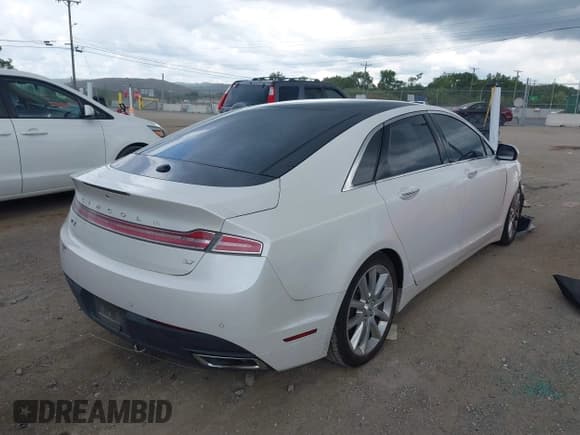 ✅ 2016 Lincoln MKZ • VIN: 3LN6L2GKXGR626259 • Lot: 42870647. Listed on IAAI with 103,267 mi. Free auction sales archive from the USA and detailed vehicle history report at DreamBid. Image 4.