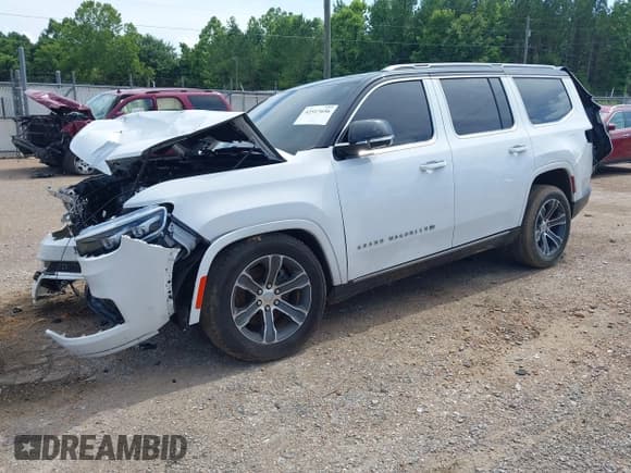 ✅ 2023 Jeep Grand Wagoneer • VIN: 1C4SJVEJ5PS510508 • Lot: 42517656. Listed on IAAI with 35,939 mi. Free auction sales archive from the USA and detailed vehicle history report at DreamBid. Image 2.