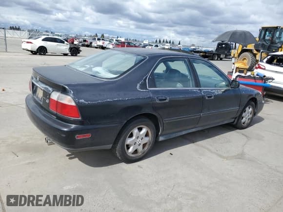✅ 1997 Honda Accord EX • VIN: 1HGCE6673VA020588 • Лот: 48215105. Опубликован ранее на Copart с пробегом 254 000 миль. Бесплатный доступ к архиву аукционных продаж из США и подробный отчёт об истории автомобиля на DreamBid. Изображение 3.