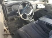 ✅ 2002 Dodge Dakota • VIN: 1B7FL16X22S676436 • Lot: 78075154. Wystawiony na Copart z przebiegiem 125 518 mil. Bezpłatny archiwum sprzedaży aukcyjnych z USA i szczegółowy raport historii pojazdu na DreamBid. Zdjęcie 8.