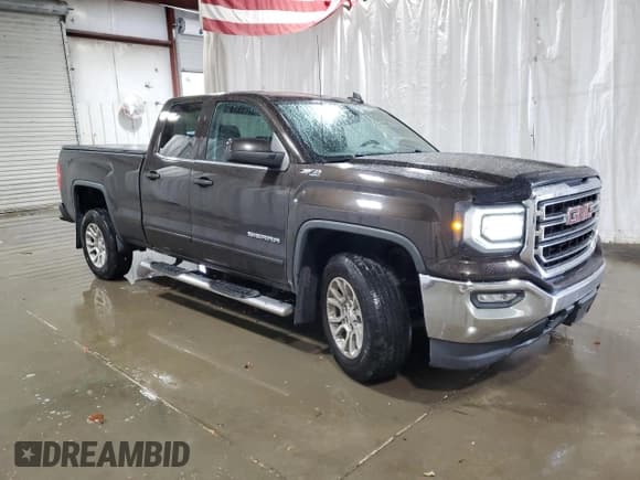 ✅ 2018 GMC Sierra 1500 SLE • VIN: 1GTV2MECXJZ243208 • Лот: 83945865. Опубликован ранее на Copart с пробегом 62 455 миль. Бесплатный доступ к архиву аукционных продаж из США и подробный отчёт об истории автомобиля на DreamBid. Изображение 4.