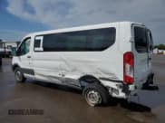 ✅ 2018 Ford Transit Passenger XL • VIN: 1FBZX2ZM1JKA20840 • Lot: 66152134. Listed on Copart with 78,961 mi. Free auction sales archive from the USA and detailed vehicle history report at DreamBid. Image 2.