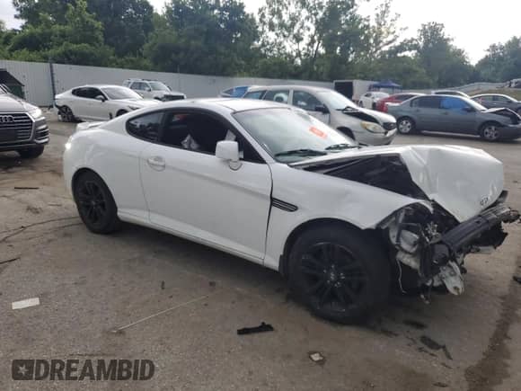2008 Hyundai Tiburon GS с VIN KMHHM66DX8U278537, выставлен на аукционе Copart как лот 62597005 с пробегом Не указан миль и Списание • Salvage title. История ставок и продаж доступна на DreamBid. Изображение 4.