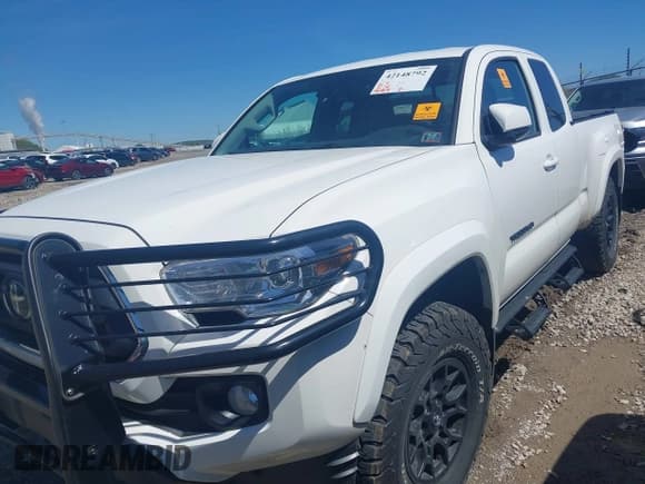 ✅ 2022 Toyota Tacoma SR • VIN: 3TYSZ5AN1NT092590 • Лот: 42148792. Опубликован ранее на IAAI с пробегом 58 154 миль. Бесплатный доступ к архиву аукционных продаж из США и подробный отчёт об истории автомобиля на DreamBid. Изображение 6.