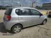 2011 Chevrolet Aveo 1LT z VIN KL1TD6DEXBB140484, wystawiony jako Copart lot #71553954 z przebiegiem 112 583 mil mil oraz Szkoda całkowita • Salvage title. Historia ofert i sprzedaży dostępna na DreamBid. Obrazek 3.