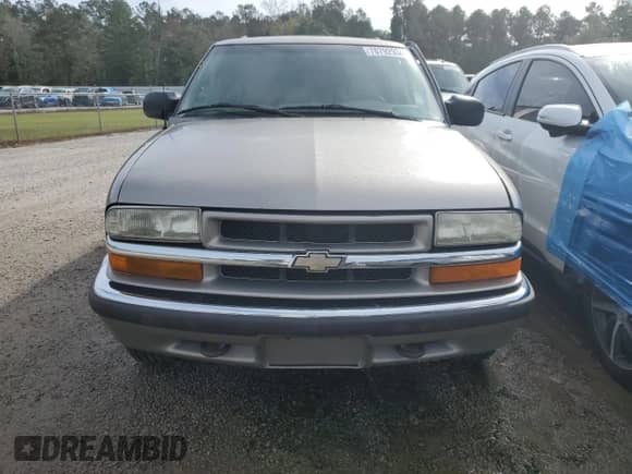 2001 Chevrolet Blazer LT z VIN 1GNDT13W912202072, wystawiony jako Copart lot #78792934 z przebiegiem 199 690 mil mil oraz Szkoda całkowita • Salvage title. Historia ofert i sprzedaży dostępna na DreamBid. Obrazek 5.