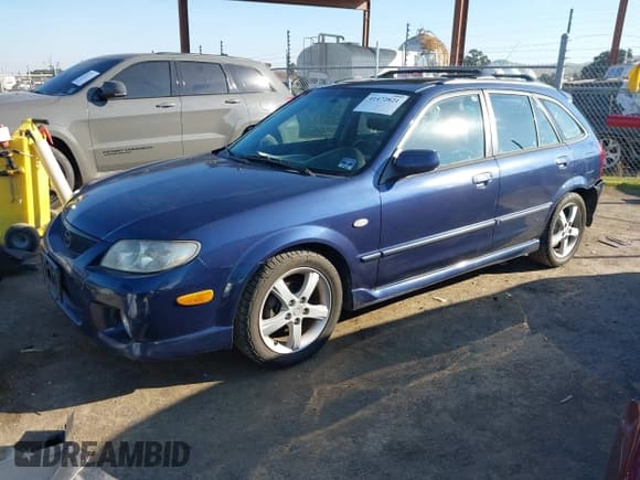 ✅ 2003 Mazda Protege • VIN: JM1BJ246831151148 • Лот: 41472821. Опубликован ранее на IAAI с пробегом 247 589 миль. Бесплатный доступ к архиву аукционных продаж из США и подробный отчёт об истории автомобиля на DreamBid. Изображение 2.