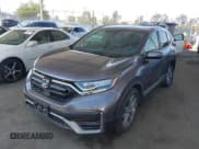 ✅ 2020 Honda CR-V Touring • VIN: 7FART6H91LE000684 • Lot: 42504731. Listed on IAAI with 49,100 mi. Free auction sales archive from the USA and detailed vehicle history report at DreamBid. Image 2.
