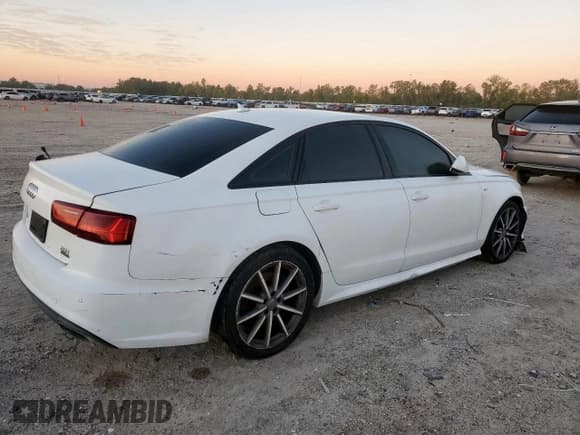 ✅ 2018 Audi A6 Premium Plus • VIN: WAUG8AFC6JN015182 • Лот: 90880355. Опубликован ранее на Copart с пробегом 89 363 миль. Бесплатный доступ к архиву аукционных продаж из США и подробный отчёт об истории автомобиля на DreamBid. Изображение 3.