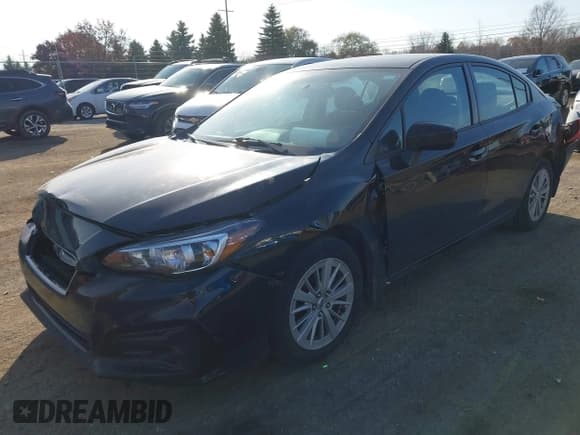✅ 2017 Subaru Impreza Premium • VIN: 4S3GKAB62H3605180 • Lot: 43697965. Listed on IAAI with 158,727 mi. Free auction sales archive from the USA and detailed vehicle history report at DreamBid. Image 2.