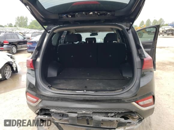 ✅ 2019 Hyundai Santa Fe SE • VIN: 5NMS23AD0KH008768 • Lot: 54502534. Wystawiony na Copart z przebiegiem 101 554 mil. Bezpłatny archiwum sprzedaży aukcyjnych z USA i szczegółowy raport historii pojazdu na DreamBid. Zdjęcie 6.