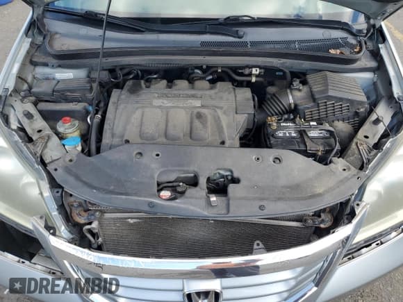 ✅ 2010 Honda Odyssey EX-L • VIN: 5FNRL3H78AB035566 • Lot: 90242685. Listed on Copart with 199,747 mi. Free auction sales archive from the USA and detailed vehicle history report at DreamBid. Image 12.