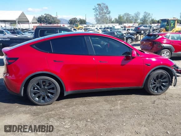 ✅ 2021 Tesla Model Y Standard Range • VIN: 5YJYGDED7MF121889 • Lot: 43455363. Listed on IAAI with 170,337 mi. Free auction sales archive from the USA and detailed vehicle history report at DreamBid. Image 13.