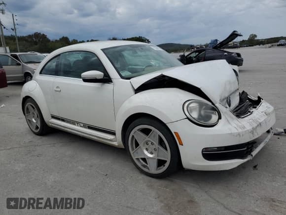 ✅ 2014 Volkswagen Beetle 2.0L TDI • VIN: 3VWJL7AT3EM612143 • Lot: 71306593. Listed on Copart with Not provided. Free auction sales archive from the USA and detailed vehicle history report at DreamBid. Image 4.