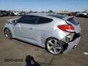 ✅ 2013 Hyundai Veloster Turbo • VIN: KMHTC6AE4DU151399 • Lot: 74385244. Wystawiony na Copart z przebiegiem 141 488 mil. Bezpłatny archiwum sprzedaży aukcyjnych z USA i szczegółowy raport historii pojazdu na DreamBid. Zdjęcie 2.