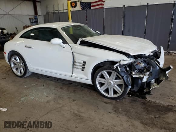 ✅ 2004 Chrysler Crossfire • VIN: 1C3AN69L14X000452 • Lot: 73599474. Listed on Copart with 69,716 mi. Free auction sales archive from the USA and detailed vehicle history report at DreamBid. Image 4.