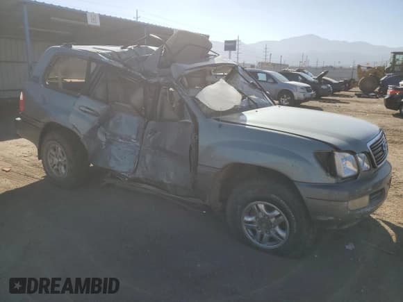 ✅ 2001 Lexus LX 470 • VIN: JTJHT00W313504215 • Lot: 74683164. Wystawiony na Copart z przebiegiem Nie podano. Bezpłatny archiwum sprzedaży aukcyjnych z USA i szczegółowy raport historii pojazdu na DreamBid. Zdjęcie 4.