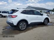 ✅ 2021 Ford Escape SEL Hybrid • VIN: 1FMCU0CZ9MUA70022 • Лот: 63195785. Опубликован ранее на Copart с пробегом 103 527 миль. Бесплатный доступ к архиву аукционных продаж из США и подробный отчёт об истории автомобиля на DreamBid. Изображение 3.