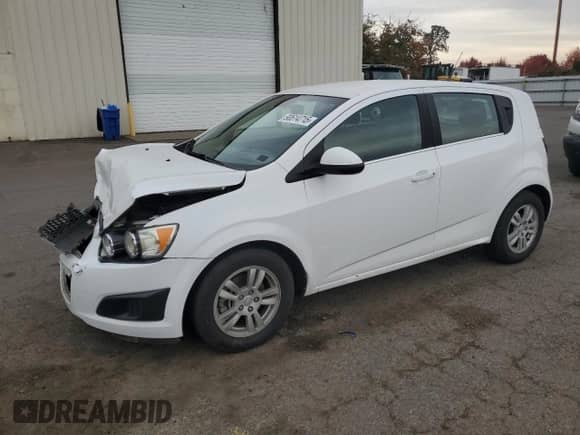 2013 Chevrolet Sonic LT with VIN 1G1JC6SG0D4230167, listed as a Copart auction lot 90614715 with 143,604 mi miles and Clean title. Bid and sale history available at DreamBid. Image 1.