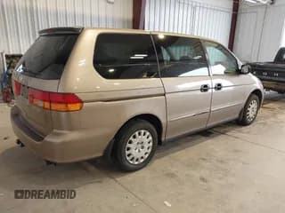 ✅ 2003 Honda Odyssey LX • VIN: 5FNRL18583B066872 • Lot: 43728524. Wystawiony na IAAI z przebiegiem 241 613 mil. Bezpłatny archiwum sprzedaży aukcyjnych z USA i szczegółowy raport historii pojazdu na DreamBid. Zdjęcie 4.