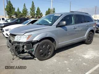 2017 Dodge Journey SE with VIN 3C4PDCAB1HT569099, listed as a Copart auction lot 85314065 with 143,721 mi miles and Salvage title. Bid and sale history available at DreamBid. Image 1.