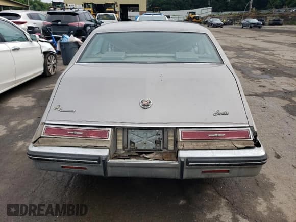 ✅ 1983 Cadillac Seville • VIN: 1G6AS6983DE800569 • Lot: 62057784. Wystawiony na Copart z przebiegiem 50 322 mil. Bezpłatny archiwum sprzedaży aukcyjnych z USA i szczegółowy raport historii pojazdu na DreamBid. Zdjęcie 6.