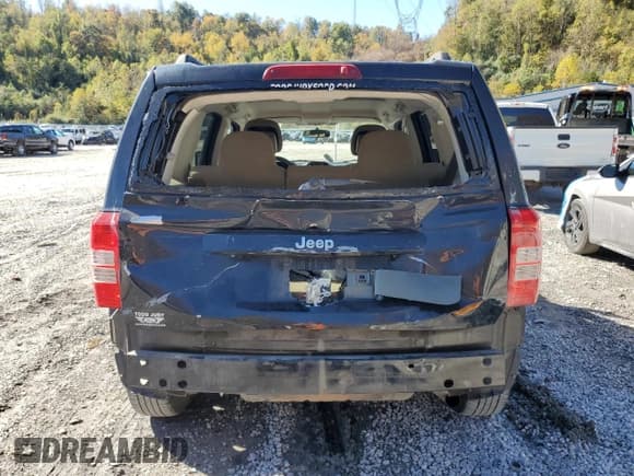 ✅ 2014 Jeep Patriot Sport • VIN: 1C4NJPBB9ED911454 • Lot: 86517465. Wystawiony na Copart z przebiegiem 145 863 mil. Bezpłatny archiwum sprzedaży aukcyjnych z USA i szczegółowy raport historii pojazdu na DreamBid. Zdjęcie 6.