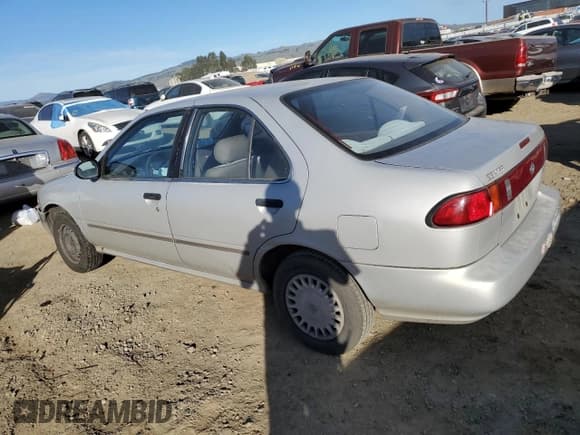 ✅ 1997 Nissan Sentra XE • VIN: 1N4AB41DXVC700157 • Lot: 88363355. Listed on Copart with 234,562 mi. Free auction sales archive from the USA and detailed vehicle history report at DreamBid. Image 2.