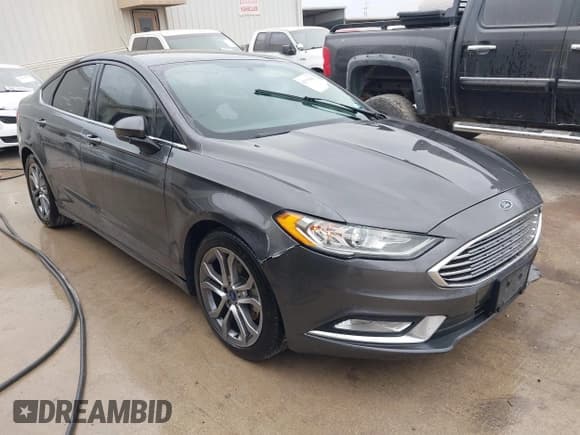 ✅ 2017 Ford Fusion S • VIN: 3FA6P0G75HR397506 • Lot: 43705442. Listed on IAAI with 194,963 mi. Free auction sales archive from the USA and detailed vehicle history report at DreamBid. Image 1.