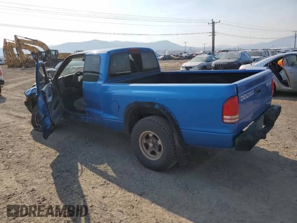 1998 Dodge Dakota SLT z VIN 1B7GG22X3WS743975, wystawiony jako Copart lot #74474074 z przebiegiem Nie podano mil oraz Czysty tytuł • Clean title. Historia ofert i sprzedaży dostępna na DreamBid. Obrazek 2.