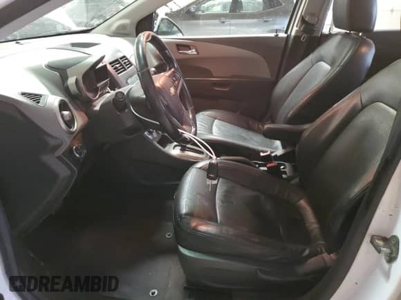 2012 Chevrolet Sonic LTZ with VIN 1G1JE5SH9C4143735, listed as a Copart auction lot 47083355 with 109,585 mi miles and Salvage title. Bid and sale history available at DreamBid. Image 7.