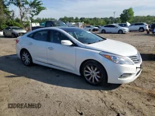 ✅ 2013 Hyundai Azera • VIN: KMHFH4JG6DA262297 • Лот: 56781155. Опубликован ранее на Copart с пробегом 234 793 миль. Бесплатный доступ к архиву аукционных продаж из США и подробный отчёт об истории автомобиля на DreamBid. Изображение 4.