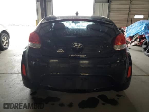 2012 Hyundai Veloster w/Red Int z VIN KMHTC6AD1CU054411, wystawiony jako Copart lot #73357964 z przebiegiem 12 486 mil mil oraz Szkoda całkowita • Salvage title. Historia ofert i sprzedaży dostępna na DreamBid. Obrazek 6.