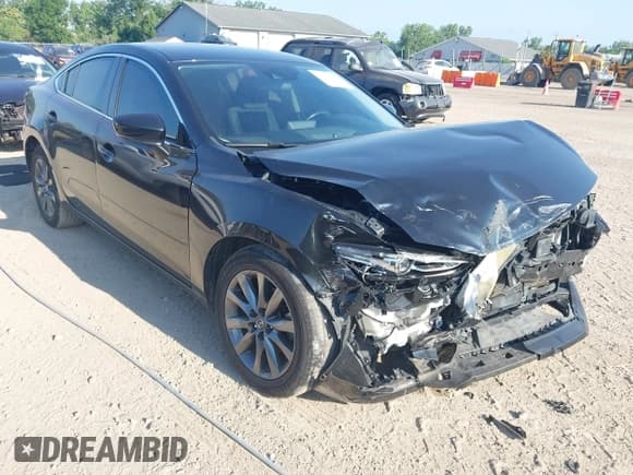 ✅ 2021 Mazda 6 Sport • VIN: JM1GL1UM6M1619078 • Lot: 42703888. Listed on IAAI with 55,800 mi. Free auction sales archive from the USA and detailed vehicle history report at DreamBid. Image 1.