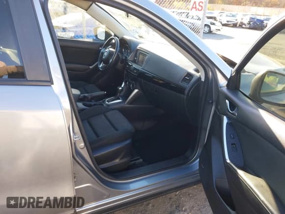 ✅ 2014 Mazda CX-5 Touring • VIN: JM3KE4CY3E0393283 • Lot: 43686574. Wystawiony na IAAI z przebiegiem 122 569 mil. Bezpłatny archiwum sprzedaży aukcyjnych z USA i szczegółowy raport historii pojazdu na DreamBid. Zdjęcie 5.