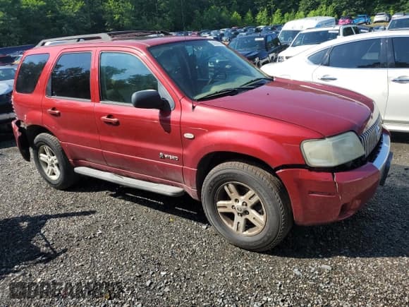 ✅ 2006 Mercury Mariner Hybrid • VIN: 4M2CU98HX6KJ01487 • Lot: 64387905. Wystawiony na Copart z przebiegiem 250 065 mil. Bezpłatny archiwum sprzedaży aukcyjnych z USA i szczegółowy raport historii pojazdu na DreamBid. Zdjęcie 4.