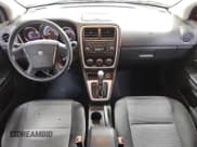 ✅ 2010 Dodge Caliber SXT • VIN: 1B3CB4HA9AD602340 • Лот: 83538394. Опубликован ранее на Copart с пробегом 125 145 миль. Бесплатный доступ к архиву аукционных продаж из США и подробный отчёт об истории автомобиля на DreamBid. Изображение 8.