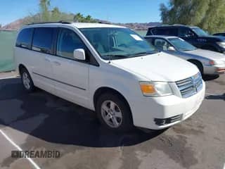 2010 Dodge Grand Caravan SXT z VIN 2D4RN5D15AR433171, wystawiony jako IAAI lot #43484173 z przebiegiem 155 938 mil mil oraz . Historia ofert i sprzedaży dostępna na DreamBid. Obrazek 1.