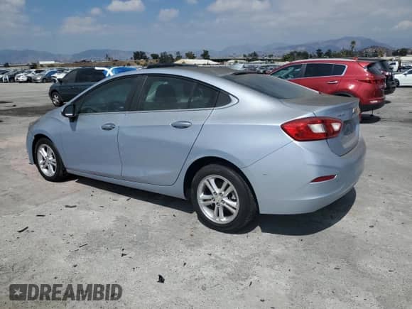 ✅ 2018 Chevrolet Cruze LT • VIN: 1G1BE5SM2J7114834 • Lot: 80557205. Listed on Copart with 131,256 mi. Free auction sales archive from the USA and detailed vehicle history report at DreamBid. Image 2.