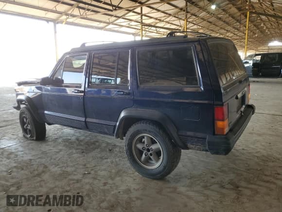 ✅ 1996 Jeep Cherokee Sport • VIN: 1J4FT68S1TL275271 • Lot: 72701214. Listed on Copart with 235,651 mi. Free auction sales archive from the USA and detailed vehicle history report at DreamBid. Image 2.