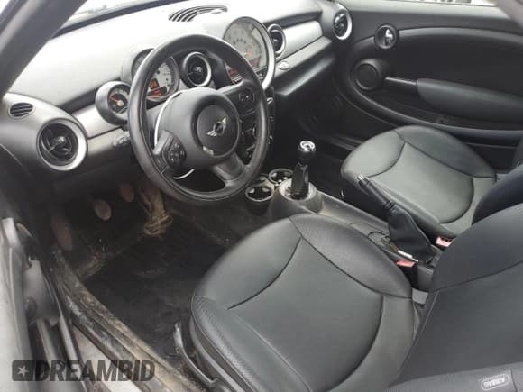 ✅ 2013 MINI Roadster • VIN: WMWSY1C5XDT429260 • Lot: 57219935. Listed on Copart with 129,719 mi. Free auction sales archive from the USA and detailed vehicle history report at DreamBid. Image 8.