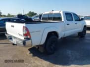 ✅ 2015 Toyota Tacoma PreRunner • VIN: 5TFKU4HN6FX006874 • Lot: 43090148. Listed on IAAI with 182,527 mi. Free auction sales archive from the USA and detailed vehicle history report at DreamBid. Image 4.
