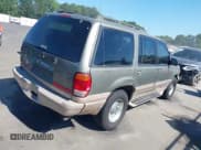 ✅ 2001 Mercury Mountaineer • VIN: 4M2ZU86P61UJ00123 • Lot: 42692270. Listed on IAAI with 261,819 mi. Free auction sales archive from the USA and detailed vehicle history report at DreamBid. Image 4.