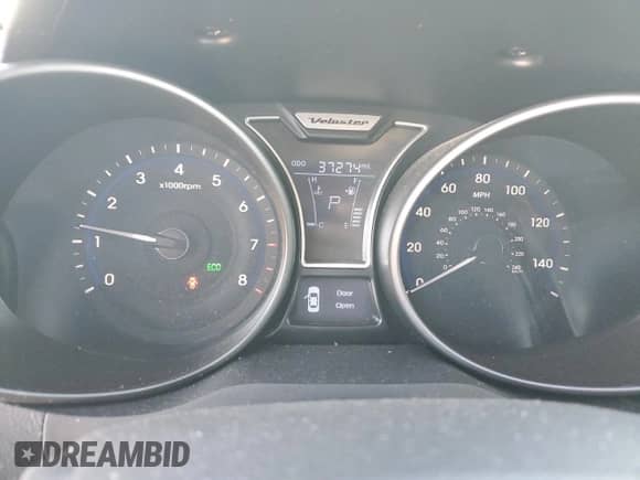 ✅ 2014 Hyundai Veloster Turbo • VIN: KMHTC6AE6EU184759 • Lot: 87099815. Wystawiony na Copart z przebiegiem 37 274 mil. Bezpłatny archiwum sprzedaży aukcyjnych z USA i szczegółowy raport historii pojazdu na DreamBid. Zdjęcie 9.