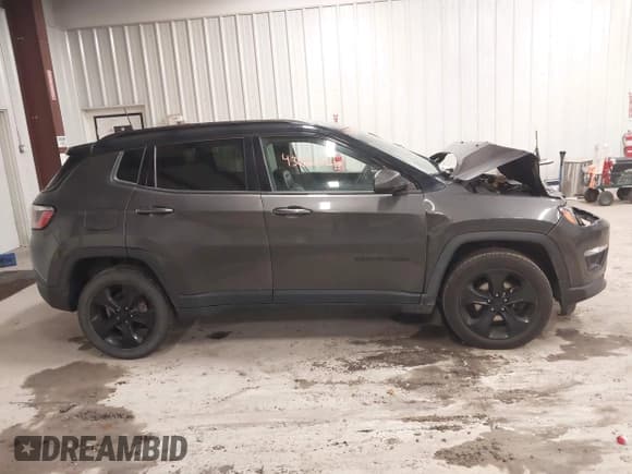 ✅ 2018 Jeep Compass Latitude • VIN: 3C4NJDBB2JT402261 • Lot: 43663748. Listed on IAAI with 124,976 mi. Free auction sales archive from the USA and detailed vehicle history report at DreamBid. Image 13.